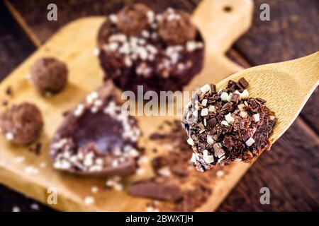 easter egg cut in half and creamy chocolate filling. Creative easter dessert concept Stock Photo