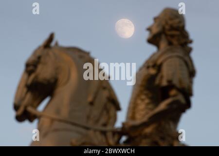 Dresden, Germany. 03rd June, 2020. The moon rises behind the equestrian statue of August the Strong, the so-called Golden Horseman. Credit: Sebastian Kahnert/dpa-Zentralbild/dpa/Alamy Live News Stock Photo
