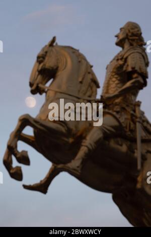Dresden, Germany. 03rd June, 2020. The moon rises behind the equestrian statue of August the Strong, the so-called Golden Horseman. Credit: Sebastian Kahnert/dpa-Zentralbild/dpa/Alamy Live News Stock Photo