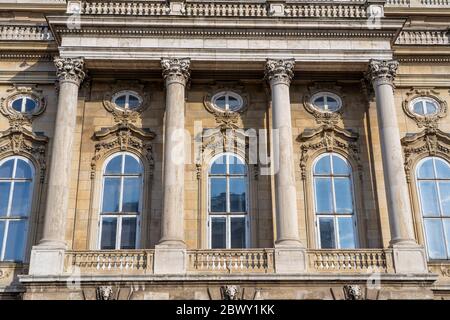 Budapest, Hungary - Feb 9, 2020: Four columns of Buda Palace facade Stock Photo