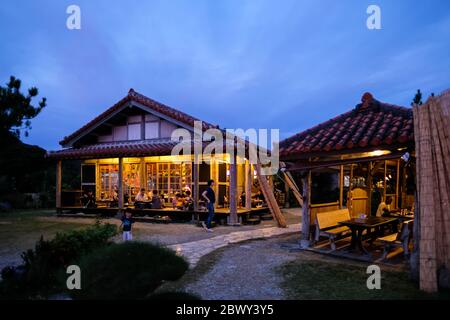 Motobu/Okinawa - ca. November 2019: A view of the Pizza in the Sky restaurant in the evening. Stock Photo