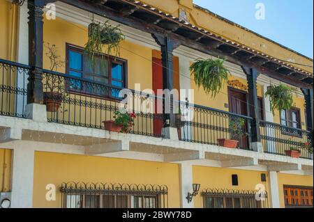 Detail of a colonial style house with a wrought iron balcony in the small city of Copan Honduras Stock Photo Alamy