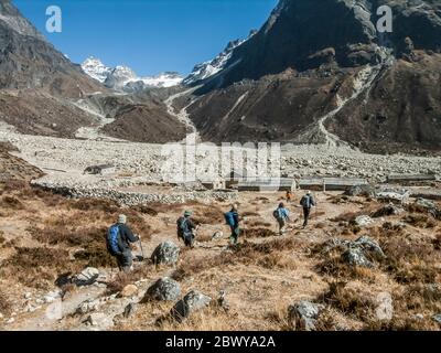 Nepal. Trek to Mera Peak.Trekkers approaching the tiny Yak herders settlement of Tagnag Stock Photo