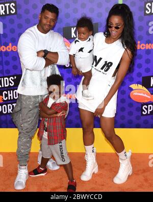 July 19, 2018, Santa Monica, California, USA: Russell Wilson,  Future Zahir Wilburn ,Sienna Princess Wilson and Ciara attends Nickelodeonâ€™s Kidsâ€™ Choice Sports 2018 hosted by Houston Chris Paul at The Barker Hanger on July 19, 2018 in Santa Monica, California. (Credit Image: © Billy Bennight/ZUMA Wire) Stock Photo