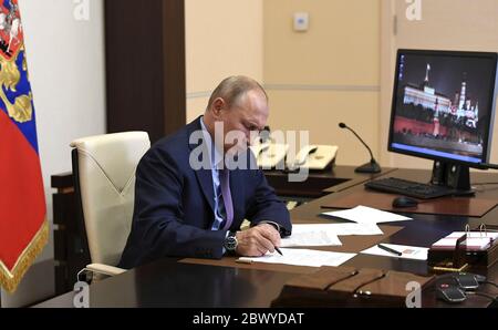 Novo-Ogaryovo, Russia. 03rd June, 2020. Russian President Vladimir Putin, chairs a meeting via video conference to discuss a diesel fuel spill in the Krasnoyarsk Region from his office at the Novo-Ogaryovo state residence June 3, 2020 outside Moscow, Russia. Credit: Aleksey Nikolskyi/Kremlin Pool/Alamy Live News Stock Photo