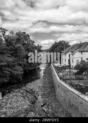 Glasgow, Scotland, UK. 3rd June 2020: A black and white photograph of a view of the White Cart Water from the Snuff Mill Bridge in Glasgow.