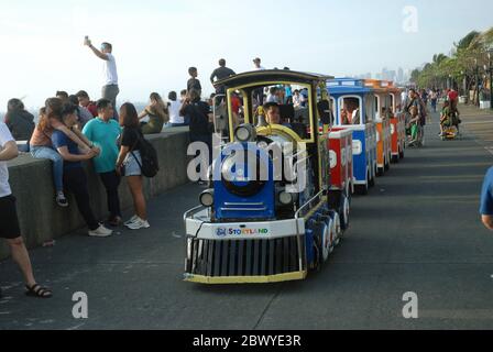 Train ride outside the Mall of Asia, Pasay, Metro Manila, The Philippines. Stock Photo