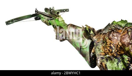 Isolated photo of a first person view hunter hand in forest camouflaged suit holding crossbow on white background side view. Stock Photo