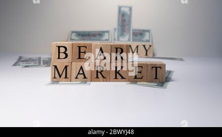 The word Bear market in wooden cubes, in white background. Stock Photo