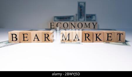 The word Bear market in wooden cubes, in white background. Stock Photo