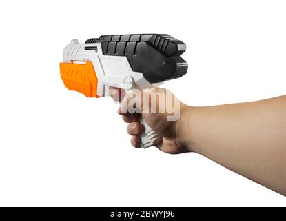 Isolated photo of hand holding a plastic water pistol on white background first person view. Stock Photo