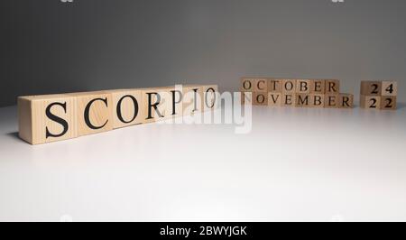 Scorpio word on wooden cubes on white background. Stock Photo