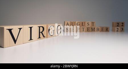 Virgo word on wooden cubes on white background. Stock Photo