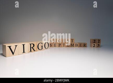 Virgo word on wooden cubes on white background. Stock Photo