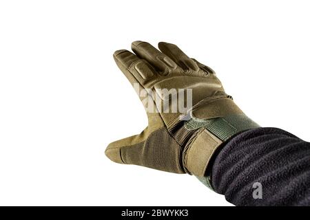Isolated first person view photo of hand palm in tactical gloves and black jacket. Stock Photo