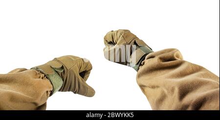 Isolated first person view photo of arm fists in tactical gloves and olive jacket. Stock Photo