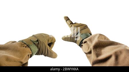 Isolated first person view photo of hand fist and finger pointing in tactical gloves and olive jacket. Stock Photo