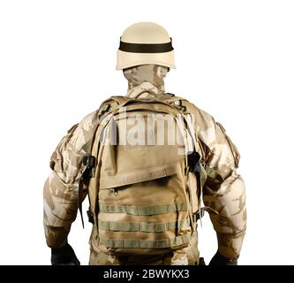Isolated photo of a fully equipped soldier in uniform, armor, helmet and backpack standing rear view. Stock Photo