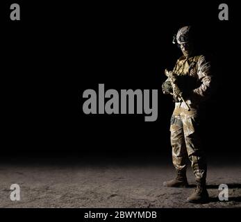 full body fully equipped soldier in tactical clothing and gear isolated ...