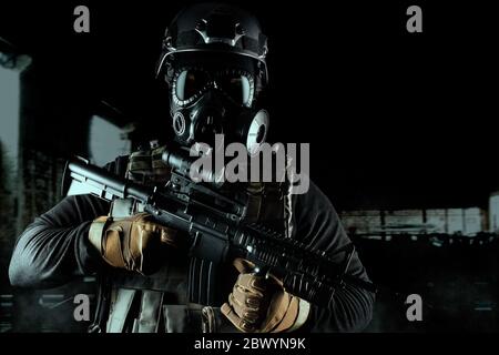 soldier fully equipped with tactical gear aiming at enemy with sniper ...