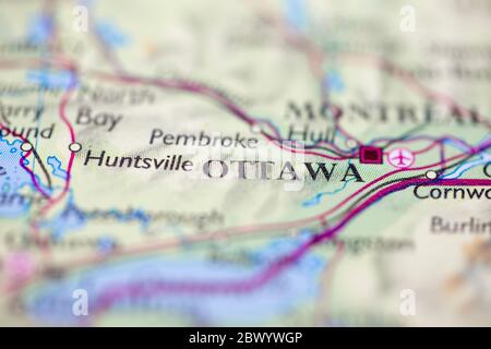 Shallow depth of field focus on geographical map location of Ottawa city Canada America continent on atlas Stock Photo