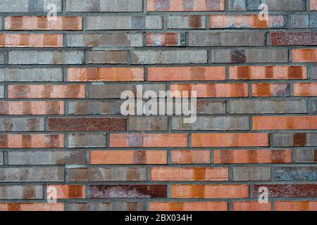 Background from a brick wall with different shades of red Stock Photo
