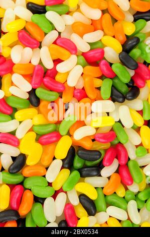 Colourful jelly bean shaped candy sweet background Stock Photo