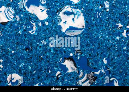 Grainy and bubbly blue plastic surface. Top view. Close-up shot. Abstract idea Stock Photo