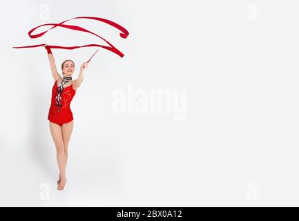 Woman with ribbon for rhythmic gymnastic. Workout sports