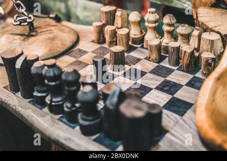 Custom chess homemade from the array of natural wood - handicraft Stock Photo