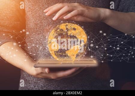 earth in hands on tablet. Concept travel. Elements of this image furnished by NASA. Cyber Security Data Protection Stock Photo