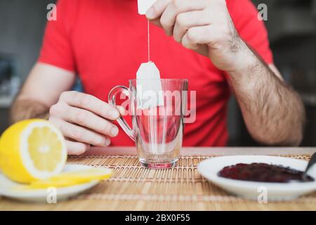 Tea bag put in transparent glass teacup - English five o'clock tea Stock Photo