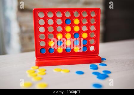 Intellectual board strategy game 'four in a row' - a game for the whole family and any age Stock Photo