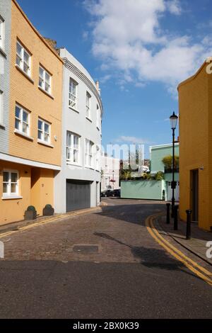 Pastel coloured housing on Redfield Lane, Earls Court, London, UK Stock Photo