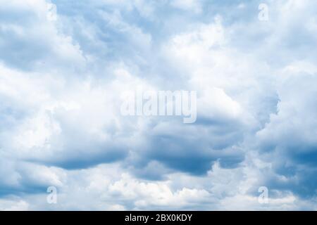 dark blue rainy clouds in sky on spring day Stock Photo