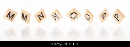 Alphabet M,N,O,P word block with white background. Stock Photo