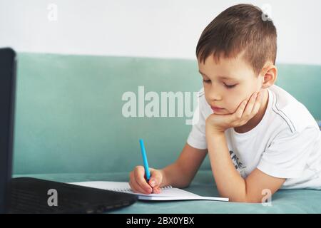distance learning at home with students . students study at home Stock Photo