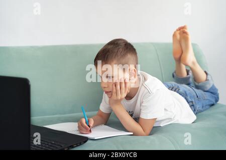 distance learning at home with students . students study at home. Stock Photo