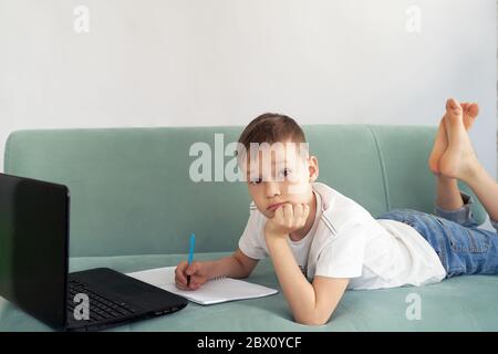 distance learning at home with students . students study at home Stock Photo