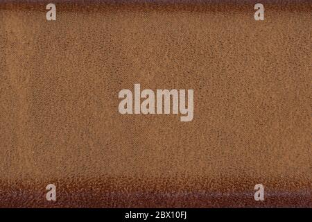background, brown leather, light in the middle, dark on the upper and lower edges Stock Photo