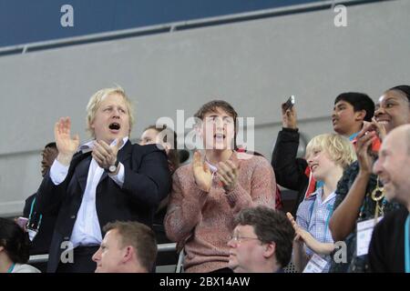 Mayor Boris Johnson with family Milo and Theo Johnson Wheeler (right) celebrating the British Team Persuit at the London Prepares UCI Track Cycling World Cup at the new Velodrome in the Olympic Village London Stock Photo