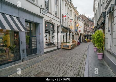 Maastricht, The Netherlands - June 18th 2018, Empty restaurant street 'Platielstraat' in the center of Maastricht waiting for costumors Stock Photo