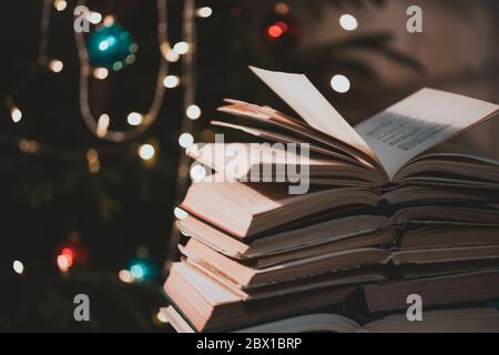 The book on bokeh background. Christmas atmosphere Stock Photo