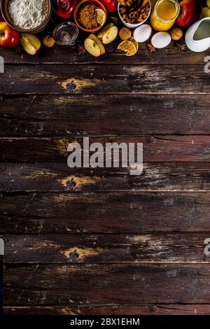Autumn baking concept. Cooking baking background with ingredients, spices and utensils. All you need for baking traditional autumn apple pie, on rusti Stock Photo
