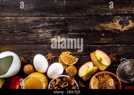 Autumn baking concept. Cooking baking background with ingredients, spices and utensils. All you need for baking traditional autumn apple pie, on rusti Stock Photo