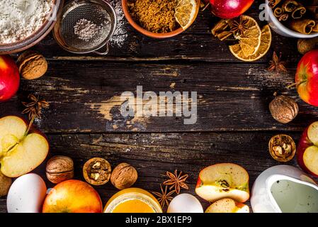 Autumn baking concept. Cooking baking background with ingredients, spices and utensils. All you need for baking traditional autumn apple pie, on rusti Stock Photo