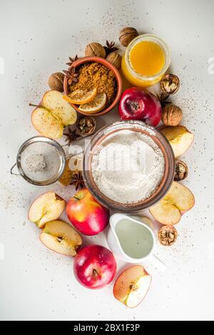 Autumn baking concept. Cooking baking background with ingredients, spices and utensils. All you need for baking traditional autumn apple pie, on rusti Stock Photo