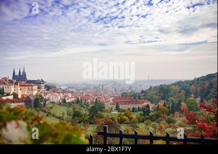 Aerial panorama from Strahovsky Cloisters (Strahov Monastery) over Prague including Prague castle and old town. Hazy views from Petrin Hill Stock Photo