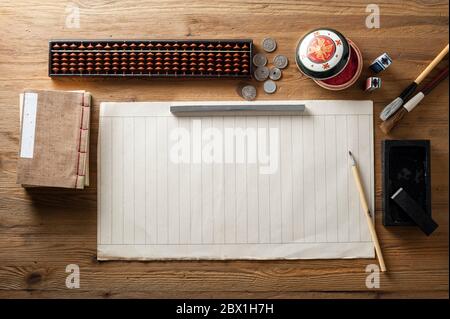 asia traditional desktop background with writing brush inkstone and other vintage objects Stock Photo