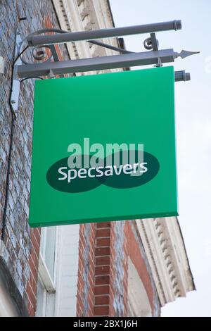 The Specsavers sign hanging from an opticians in the UK Stock Photo